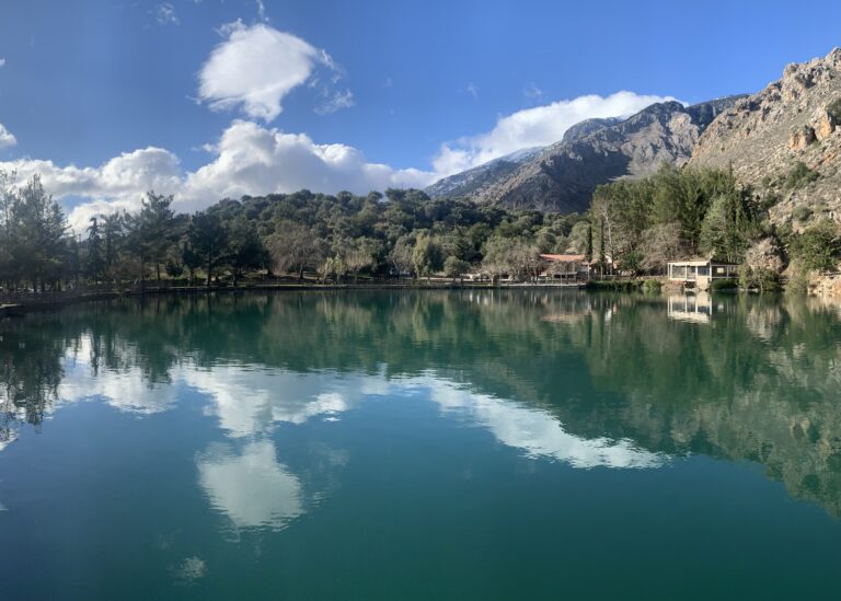 beautiful lake under a white cloud on the blue sky